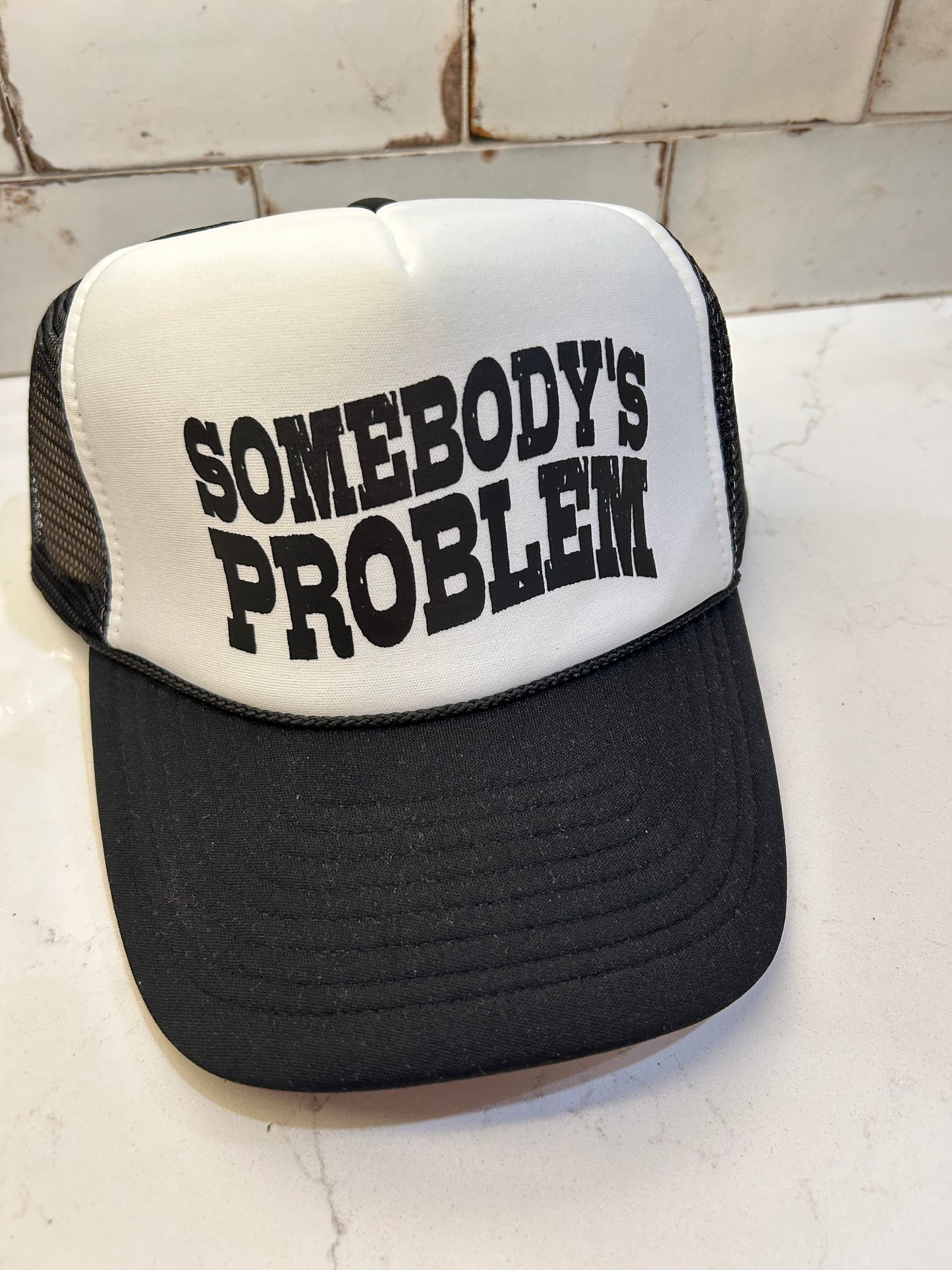 Somebody's Problem Trucker Hat